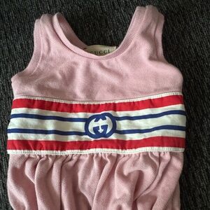 Baby pink and white interlocking Gucci bodysuit